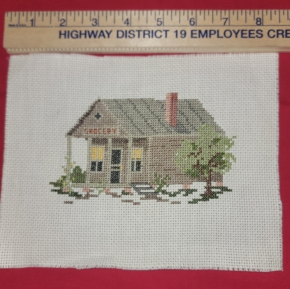 Cross-stitch grocery store. Just needs a frame.